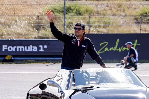 ZANDVOORT - Sergio Perez from Mexico and driver for Cadillac Formula 1 Team during the drivers parade for the Formula 1 Heineken Dutch Grand Prix at Circuit Zandvoort on August 23, 2026 in Zandvoort, the Netherlands. MARCEL TER BALS ANP xVIxANPxSportx xMarcelxterxBalsxIVx 566096322 originalFilename: 566096322.jpg