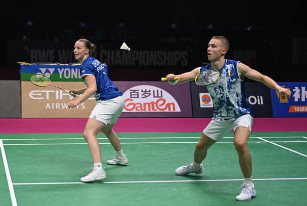 (260823) -- NEW DELHI, Aug. 23, 2026 -- Thom Gicquel (R) Delphine Delrue of France compete during the mixed doubles final match against Feng Yanzhe Huang Dongping of China at BWF World Championships in New Delhi, India, Aug. 23, 2026. ) (SP)INDIA-NEW DELHI-BADMINTON-BWF WORLD CHAMPIONSHIPS-MIXED DOUBLES JavedxDar 