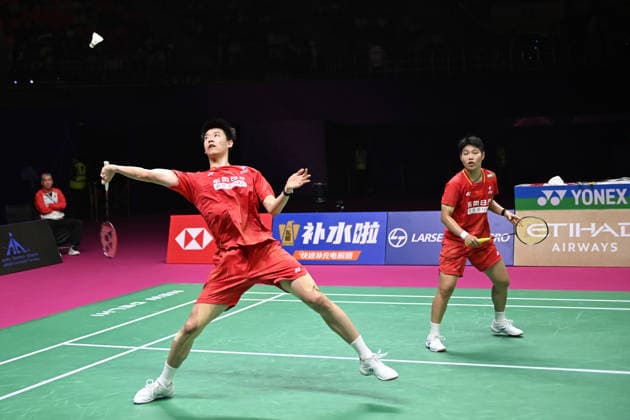 (260823) -- NEW DELHI, Aug. 23, 2026 -- Feng Yanzhe (L) Huang Dongping of China compete during the mixed doubles final match against Thom Gicquel Delphine Delrue of France at BWF World Championships in New Delhi, India, Aug. 23, 2026. ) (SP)INDIA-NEW DELHI-BADMINTON-BWF WORLD CHAMPIONSHIPS-MIXED DOUBLES JavedxDar 