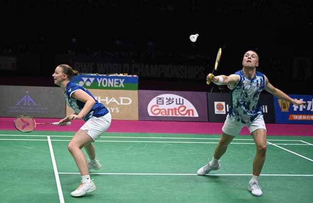 (260823) -- NEW DELHI, Aug. 23, 2026 -- Thom Gicquel (R) Delphine Delrue of France compete during the mixed doubles final match against Feng Yanzhe Huang Dongping of China at BWF World Championships in New Delhi, India, Aug. 23, 2026. ) (SP)INDIA-NEW DELHI-BADMINTON-BWF WORLD CHAMPIONSHIPS-MIXED DOUBLES JavedxDar 