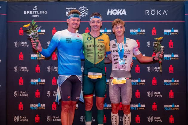 Leipzig - Triathlon-Premiere in Leipzig: Willy Hirsch und Caroline Pohle gewinnen Ironman 70.3, Leipziger Geschwister auf Platz 2 (Teil 2) 23.08.2026 ab 8 Uhr¨Stadtgebiet Leipzig und Umland ¨Fotograf: EHL Media Erik-Holm Langhof Im Foto: Rico Bogen, Zweiter Platz, Wilhelm Willy Hirsch, Erster Platz und Pierre Dupuy, Dritter Platz (von links) Am Sonntagmorgen startete am Cospudener See erstmals ein Ironman 70.3 in Leipzig. Sportamtsleiterin Katja Büchel gab um 8 Uhr den Startschuss für die männlichen Profis, fünf Minuten später folgten die Profi-Frauen sowie weitere Minuten später Hunderte Amateur-Sportler. Insgesamt nahmen rund 2.500 Triathleten an der Veranstaltung teil. Vor ihnen lagen 1,9 Kilometer Schwimmen, 90 Kilometer Radfahren durch das Leipziger Neuseenland sowie ein abschließender Halbmarathon insgesamt rund 113 Kilometer. Schlussendlich setzte sich bei den Männern Wilhelm Willy Hirsch durch und gewann die Leipziger Premiere. Der Leipziger Triathlet Rico Bogen belegte den zweiten Platz, der Franzose Pierre Dupuy kam auf Platz drei. Das Rennen der Frauen entschied Caroline Pohle für sich. Bogens Schwester Bianca Bogen erreichte ebenfalls Platz zwei. Auf den dritten Podestplatz bei den Frauen kam Brooke Gillies aus Großbritannien. Leipzig Sachsen Deutschland *** Leipzig Triathlon Debut in Leipzig: Willy Hirsch and Caroline Pohle Win the Ironman 70.3, Leipzig Siblings Take Second Place Part 2 August 23, 2026, starting at 8 a.m.¨Leipzig City Area and Surrounding Region ¨Photographer EHL Media Erik Holm Langhof Pictured: Rico Bogen, second place, Wilhelm Willy Hirsch, first place, and Pierre Dupuy, third place, from left. On Sunday morning, an Ironman 70.3 took place for the first time in Leipzig at Lake Cospuden. Katja Büchel, head of the sports department, gave the starting signal for the male professionals at 8 a.m., followed five minutes later by the professional women and, a few minutes after that, by hundreds of amateur athletes. A total of around 2,500 triathletes participated in the event. Ahead of them lay a 1.9-kilometer swim, a 90-kilometer bike ride through Leipzig’s Neuseenland, and a concluding half-marathon—a total of about 113 kilometers. In the end, Wilhelm Willy Hirsch prevailed in the men’s race and won the Leipzig debut. Leipzig triathlete Rico Bogen took second place, while Pierre Dupuy of France finished third. Caroline Pohle won the women’s race. Bogen’s sister, Bianca Bogen, also took second place. Brooke Gillies from Great Britain claimed the third spot on the women’s podium. Leipzig, Saxony, Germany Copyright: xEHLxMedia Erik-HolmxLanghofx 20260823_ironman-leipzig_27