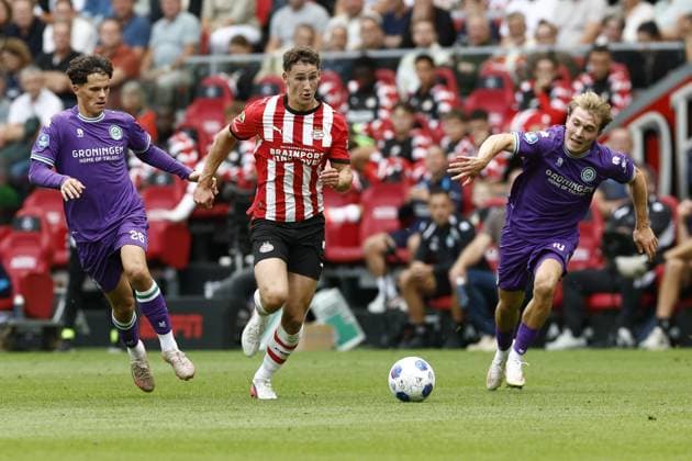 EINDHOVEN , 23-08-2026 , Philips stadium , season 2026 202 , Dutch Eredivisie football , match between PSV and FC Gronngen , picture shows PSV player Ruben van Bommel , FC Groningen player Thom van Bergen PSV - Groningen  x205973898x Copyright: