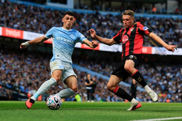Manchester City v Bournemouth, Premier League Phil Foden (47) of Manchester City is challenged by Adrien Truffert (3) of Bournemouth during the Premier League match between Manchester City and Bournemouth at the Etihad Stadium, Manchester, UK on 23 August 2026. Manchester Etihad Stadium Manchester UK Editorial use only DataCo restrictions apply See www.football-dataco.com , Copyright: xConorxMolloyx PSI-24721-0028
