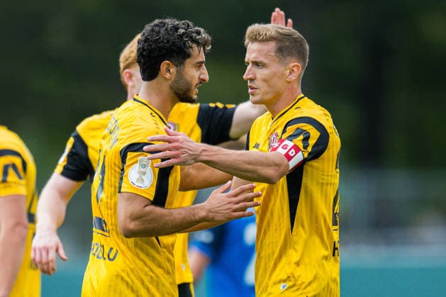 23.08.2026 - Fußball, 2026 2027, DFB-Pokal, 1. Hauptrunde, SV Westfalia Rhynern - SG Dynamo Dresden: (R) Niklas Hauptmann (Dresden) jubelt nach seinem Tor zum 0:2 mit (L) Kaan Inanoglu (Dresden) DFB REGULATIONS PROHIBIT ANY USE OF PHOTOGRAPHS AS IMAGE SEQUENCES AND OR QUASI-VIDEO. *** August 23, 2026, Soccer, 2026–2027, DFB Cup, 1st Round, SV Westfalia Rhynern vs. SG Dynamo Dresden; Niklas Hauptmann of Dresden celebrates his goal to make it 0–2 with L Kaan Inanoglu of Dresden. DFB regulations prohibit any use of photographs as image sequences and or quasi-video.
