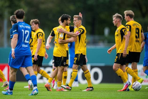 23.08.2026 - Fußball, 2026 2027, DFB-Pokal, 1. Hauptrunde, SV Westfalia Rhynern - SG Dynamo Dresden: (M) Niklas Hauptmann (Dresden) jubelt nach seinem Tor zum 0:2 mit Kaan Inanoglu (Dresden) DFB REGULATIONS PROHIBIT ANY USE OF PHOTOGRAPHS AS IMAGE SEQUENCES AND OR QUASI-VIDEO. *** August 23, 2026 Soccer, 2026–2027, DFB Cup, 1st Round, SV Westfalia Rhynern vs. SG Dynamo Dresden; Niklas Hauptmann (Dresden) celebrates with Kaan Inanoglu (Dresden) after scoring the goal to make it 0–2. DFB regulations prohibit any use of photographs as image sequences and or quasi-video.