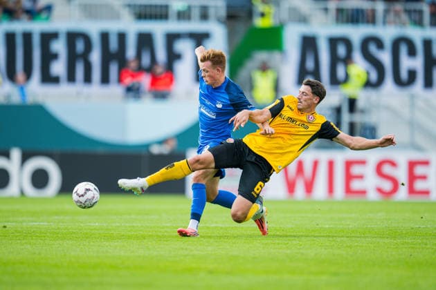23.08.2026 - Fußball, 2026 2027, DFB-Pokal, 1. Hauptrunde, SV Westfalia Rhynern - SG Dynamo Dresden: (L-R) Henrik Koch (Rhynern), Nicolai Rapp (Dresden) DFB REGULATIONS PROHIBIT ANY USE OF PHOTOGRAPHS AS IMAGE SEQUENCES AND OR QUASI-VIDEO. *** August 23, 2026 Soccer, 2026–2027, DFB Cup, 1st Round, SV Westfalia Rhynern vs. SG Dynamo Dresden; Referee: Henrik Koch (Rhynern), Nicolai Rapp (Dresden). DFB regulations prohibit any use of photographs as image sequences and or quasi-video.