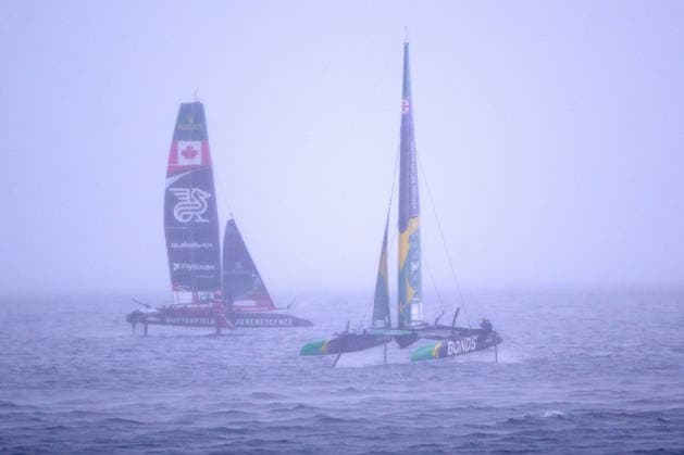 GER, Sail GP, Rockwool Germany Sail Grand Prix, Sassnitz, 22.-23.08.2026, Deutschland, Samstag, 23.08.2026, Renntag 2, BONDS FLYING ROOS - Sail GP Team - Australia; Driver - Tom Slingsby, NORTHSTAR - Sail GP TeaM - CANADA; Driver - Giles Scott, extremer Regen in Sassnitz, GER, Sail GP, Rockwool Germany Sail Grand Prix, Sassnitz, 22.-23.08.2026, Deutschland, Samstag, 23.08.2026, Renntag 2, *** GER, Sail GP, Rockwool Germany Sail Grand Prix, Sassnitz, August 22–23, 2026, Germany, Saturday, August 23, 2026, Race Day 2, BONDS FLYING ROOS Sail GP Team Australia Driver Tom Slingsby, NORTHSTAR Sail GP Team Canada Driver Giles Scott, heavy rain in Sassnitz, GER, Sail GP, Rockwool Germany Sail Grand Prix, Sassnitz, August 22–23, 2026, Germany, Saturday, August 23, 2026, Race Day 2, Copyright: xClaudiusxRauchx