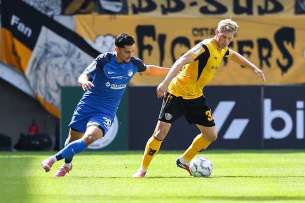 2026.08.23, xkwix, Fußball, DFB-Pokal, SV Westfalia Rhynern - Dynamo Dresden, LVM-Preußenstadion, 1.Runde, Saison 2026 2027: Jonas Sterner (Dynamo Dresden 32) im Zweikampf gegen Melih Sayin (SV Westfalia Rhynern 30) DFB regulations prohibit any use of photographs as image sequences and or quasi-video. Photo: xKamilxWilkowskixPressefotoKochx Nordrhein-Westfalen Deutschland *** August 23, 2026, xkwix, Soccer, DFB Cup, SV Westfalia Rhynern vs. Dynamo Dresden, LVM Preußenstadion, 1st Round, 2026–2027 Season: Jonas Sterner of Dynamo Dresden (32) in a tackle against Melih Sayin of SV Westfalia Rhynern (30). DFB regulations prohibit any use of photographs as image sequences and or quasi-video. Photo: xKamilxWilkowskixPressefotoKochx, North Rhine-Westphalia Germany