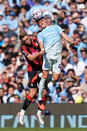 Brighton and Hove, England, 23rd August 2026. Adrien Truffert of Bournemouth and Phil Foden of Manchester City during the Brighton and Hove Albion vs Aston Villa Premier League match at the AMEX Stadium, Brighton and Hove. Picture credit should read: Paul Terry Sportimage EDITORIAL USE ONLY. No use with unauthorised audio, video, data, fixture lists, club league logos or live services. Online in-match use limited to 120 images, no video emulation. No use in betting, games or single club league player publications. SPI_054_AY_Man_City_Bournemouth SPI-4931-0023