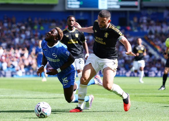 Brighton and Hove, England, 23rd August 2026. Ibrahim Osman of Brighton tackled by John McGinn of Aston Villa during the Brighton and Hove Albion vs Aston Villa Premier League match at the AMEX Stadium, Brighton and Hove. Picture credit should read: Paul Terry Sportimage EDITORIAL USE ONLY. No use with unauthorised audio, video, data, fixture lists, club league logos or live services. Online in-match use limited to 120 images, no video emulation. No use in betting, games or single club league player publications. SPI_019_PT_Brighton_Villa SPI-4931-0025