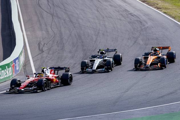 ZANDVOORT - Lewis Hamilton of Great Britain, driver for Scuderia Ferrari HP, and Lando Norris of Great Britain, driver for McLaren Formula 1 Team, overtake Andrea Kimi Antonelli of Italy, driver for Mercedes-AMG PETRONAS F1 Team, during the Formula 1 Heineken Dutch Grand Prix at Circuit Zandvoort on August 23, 2026, in Zandvoort, the Netherlands. MARCEL TER BALS ANP xVIxANPxSportx xMarcelxterxBalsxIVx 566108550 originalFilename: 566108550.jpg