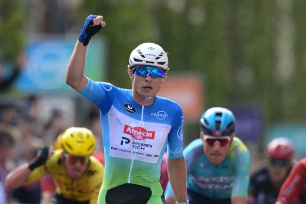 Belgian Jasper Philipsen pictured as he crosses the finish line of the fifth and last stage of the Renewi Tour multi-stage cycling race, from and to Leuven (183,7 km) on Sunday 23 August 2026. The five-day race takes place from 19 to 23 08. DAVIDxPINTENS  x0864635635stx