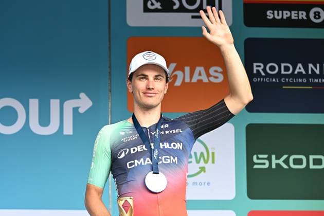 Belgian Arnaud De Lie pictured on the podium after the fifth and last stage of the Renewi Tour multi-stage cycling race, from and to Leuven (183,7 km) on Sunday 23 August 2026. The five-day race takes place from 19 to 23 08. DAVIDxPINTENS  x0864635723stx