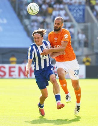 Jena - Darmstadt DFB Pokal Jena, 23.08.2026, Ernst-Abbe-Sportfeld, Fussball, DFB-Pokal, 1.Hauptrunde , FC Carl Zeiss Jena vs. SC Darmstadt 98 , Im Bild von links: Elias Löder Loeder (18, Jena), Aleksandar Vukotic ( 20, Darmstadt). , Nur zur redaktionellen Nutzung. Only editorial use. , DFB regulations prohibit any use of photographs as image sequences and or quasi-video. , *** Jena vs. Darmstadt, DFB Cup, Jena, August 23, 2026, Ernst Abbe Sportfeld, Soccer, DFB Cup, 1st Round, FC Carl Zeiss Jena vs. SC Darmstadt 98, Pictured from left: Elias Löder (No. 18), Jena, Aleksandar Vukotic (No. 20), Darmstadt; For editorial use only; DFB regulations prohibit any use of photographs as image sequences and or quasi-video; Picture Point