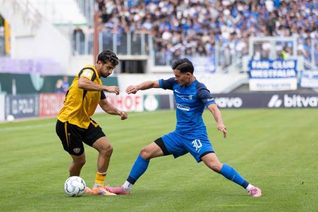 Münster, Deutschland 23. August 2026: DFB-Pokal - 2026 2027 - 1. Runde - SV Westfalia Rhynern gegen SG Dynamo Dresden Im Bild: v. li. im Zweikampf Kaan Inanoglu (SGD), Melih Sayin (S.V) DFL DFB regulations prohibit any use of photographs as image sequences and or quasi-video. LVM-Preußenstadion Nordrhein Westfalen *** Münster, Germany, August 23, 2026, 2026–2027 DFB Cup, First Round: SV Westfalia Rhynern vs. SG Dynamo Dresden. Pictured, from left, in a tackle: Kaan Inanoglu (SGD), Melih Sayin (SV DFL). DFB regulations prohibit any use of photographs as image sequences and or quasi-video. LVM Preußenstadion, North Rhine-Westphalia Copyright: xFotostandx xZeisingx