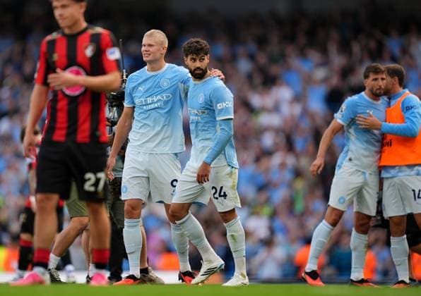 Josko Gvardiol (24) is congratulated at full time by his Manchester City teammate Erling Haaland after he had scored the winning Manchester City v Bournemouth, Premier League, Football, Etihad Stadium, Manchester, UK - 23 Aug 2026Manchester Etihad Stadium United Kingdom EDITORIAL USE ONLY No use with unauthorised audio, video, data, fixture lists, club league logos or live services. Online in-match use limited to 120 images, no video emulation. No use in betting, games or single club league player publications.  Copyright: xWiredxPhotos Shutterstockx 17113667cc