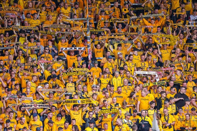 2026.08.23, xkwix, Fußball, DFB-Pokal, SV Westfalia Rhynern - Dynamo Dresden, LVM-Preußenstadion, 1.Runde, Saison 2026 2027: Dynamo Fans im Gaesteblock halten Schals hoch DFB regulations prohibit any use of photographs as image sequences and or quasi-video. Photo: xKamilxWilkowskixPressefotoKochx Nordrhein-Westfalen Deutschland *** August 23, 2026, xkwix, Soccer, DFB Cup, SV Westfalia Rhynern vs. Dynamo Dresden, LVM Preußenstadion, Round 1, 2026–2027 season; Dynamo fans in the visitors section hold up scarves. DFB regulations prohibit any use of photographs as image sequences and or quasi-video. Photo: xKamilxWilkowskixPressefotoKochx, North Rhine-Westphalia, Germany