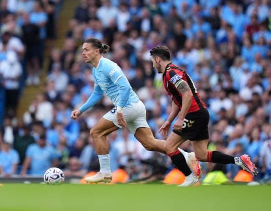 Jack Grealis of Manchester City gets away from Adam Smith of Bournemouth Manchester City v Bournemouth, Premier League, Football, Etihad Stadium, Manchester, UK - 23 Aug 2026Manchester Etihad Stadium United Kingdom EDITORIAL USE ONLY No use with unauthorised audio, video, data, fixture lists, club league logos or live services. Online in-match use limited to 120 images, no video emulation. No use in betting, games or single club league player publications.  Copyright: xWiredxPhotos Shutterstockx 17113667cs