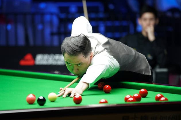 WUHAN, CHINA - AUGUST 23: Xiao Guodong of China plays a shot during his 5-0 victory against Wang Xinbo of China in the round of 64 at the 2026 Wuhan Open on August 23, 2026 in Wuhan, Hubei Province of China. The tournament features top snooker players competing for the title.  Copyright: xTaixChengzhex 111661673573
