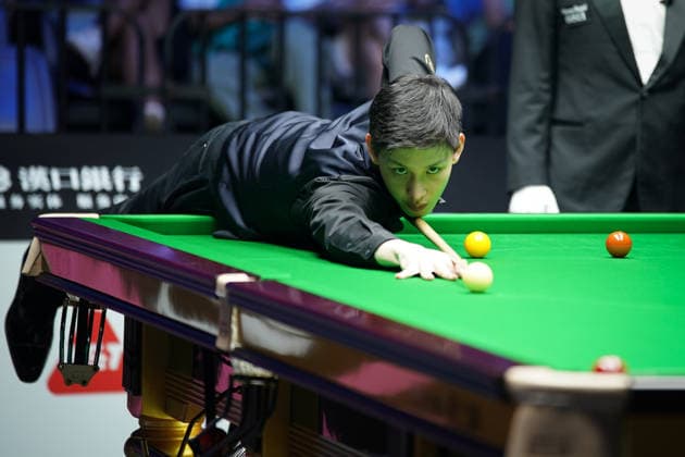 WUHAN, CHINA - AUGUST 23: Wang Xinbo of China plays a shot during his match against Xiao Guodong of China in the round of 64 at the 2026 Wuhan Open on August 23, 2026 in Wuhan, Hubei Province of China. Xiao defeated Wang 5-0 to advance to the round of 32.  Copyright: xTaixChengzhex 111661673576