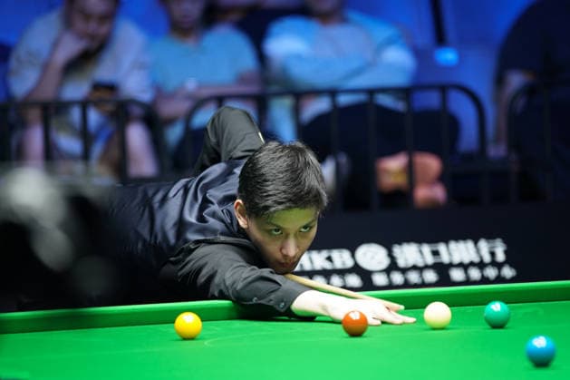 WUHAN, CHINA - AUGUST 23: Wang Xinbo of China plays a shot during his match against Xiao Guodong of China in the round of 64 at the 2026 Wuhan Open on August 23, 2026 in Wuhan, Hubei Province of China. Xiao defeated Wang 5-0 to advance to the round of 32.  Copyright: xTaixChengzhex 111661673566