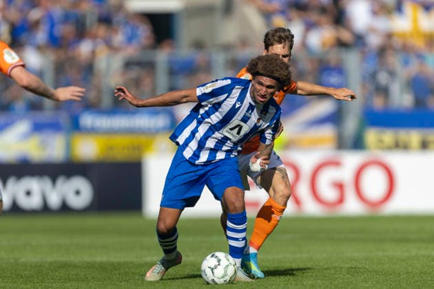 GER, Jena, Fussball, DFB-Pokal, 1. Hauptrunde, FC Carl-Zeiss Jena vs. SV Darmstadt 98 im Bild v.l.: Kevin Lankford (FC Carl-Zeiss Jena 07), Zweikampf 23.08.2026, Ernst Abbe Sportfeld Jena DFB REGULATIONS PROHIBIT ANY USE OF PHOTOGRAPHS AS IMAGE SEQUENCES AND OR QUASI-VIDEO, *** GER, Jena, Soccer, DFB Cup, 1st Round, FC Carl Zeiss Jena vs. SV Darmstadt 98; pictured from left: Kevin Lankford, FC Carl Zeiss Jena 07, tackle on 08 23 2026, Ernst Abbe Sportfeld, Jena. DFB regulations prohibit any use of photographs as image sequences and or quasi-video, Copyright: HMBxMedia PaulxFritz