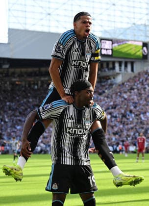 Newcastle Upon Tyne, England, 23rd August 2026. Anthony Elanga of Newcastle United celebrates scoring the first goal with William Osula of Newcastle United during the Newcastle United vs Liverpool Premier League match at St. James Park, Newcastle Upon Tyne. Picture credit should read: Anna Gowthorpe Sportimage EDITORIAL USE ONLY. No use with unauthorised audio, video, data, fixture lists, club league logos or live services. Online in-match use limited to 120 images, no video emulation. No use in betting, games or single club league player publications. SPI_026_AG_Newcastle_Liverpool SPI-4932-0026