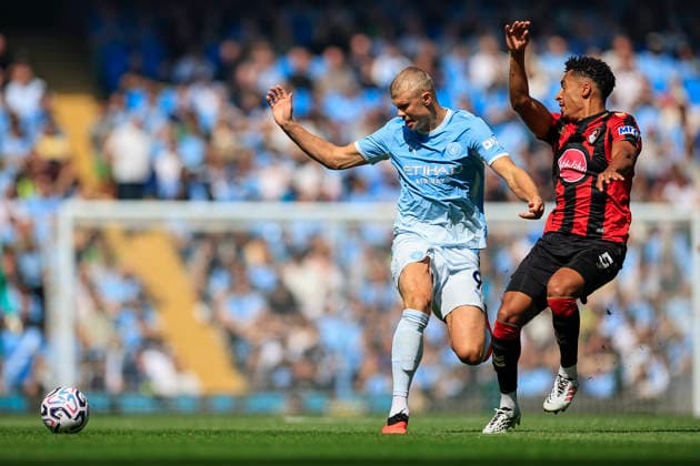 Manchester City v Bournemouth, Premier League Erling Haaland (9) of Manchester City is watched by James Hill (5) of Bournemouth during the Premier League match between Manchester City and Bournemouth at the Etihad Stadium, Manchester, UK on 23 August 2026. Manchester Etihad Stadium Manchester UK Editorial use only DataCo restrictions apply See www.football-dataco.com , Copyright: xConorxMolloyx PSI-24721-0071