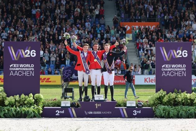 Siegerehrung, Podium, 1. Platz, Weltmeister Steve Guerdat (SUI, Schweiz) mit Pferd Dynamix de Belheme, 2. Platz Thibeau Spits (BEL, Belgien, Belgium) mit Pferd Impress-K vaunt Kattenheye Z , Harry Charles (GBR, Vereinigtes Königsreich, Großbritannien) mit Pferd LT Holst Freda, Springen, FEI Jumping World Championship, WM, Weltmeisterschaft , FEI Jumping World Championship, Competition Individual Final, Longines-Prize, Longines-Preis, Finale Einzelwertung, Jumping , AACHEN - FEI World Championships 2026, Weltfest des Pferdesports, Reitsport Weltmeisterschaft 2026, Aachen 2026, Welcome Home 2026, Aachener Soers, 11. bis 23. August 2026, Reitsport, 23.08.2026, Aachen Aachener Soers Deutschland *** Awards Ceremony, Podium, 1st place: World Champion Steve Guerdat (SUI), Switzerland, riding Dynamix de Belheme; 2nd place: Thibeau Spits (BEL), Belgium, riding Impress K vaunt Kattenheye Z; Harry Charles (GBR), United Kingdom, riding LT Holst Freda; Show Jumping, FEI Jumping World Championship, FEI Jumping World Championship, Individual Final, Longines Prize, Longines Prize, Individual Final, Show Jumping, AACHEN FEI World Championships 2026, World Festival of Equestrian Sports, 2026 Equestrian World Championships, Aachen 2026, Welcome Home 2026, Aachen Soers, August 11–23, 2026, Equestrian Sports, August 23, 2026, Aachen Soers, Germany