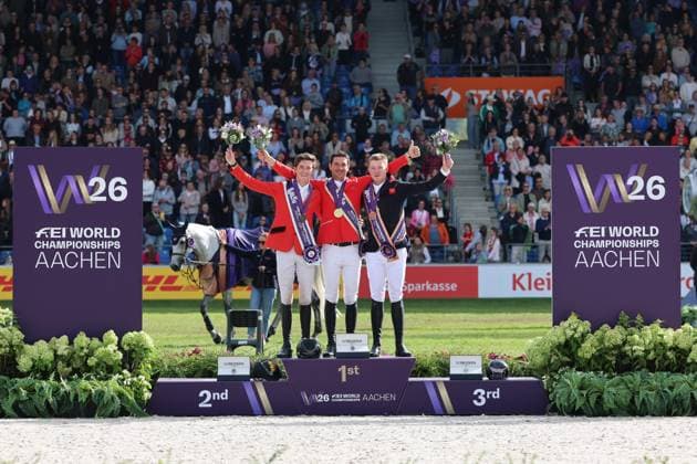 Siegerehrung, Podium, 1. Platz, Weltmeister Steve Guerdat (SUI, Schweiz) mit Pferd Dynamix de Belheme, 2. Platz Thibeau Spits (BEL, Belgien, Belgium) mit Pferd Impress-K vaunt Kattenheye Z , Harry Charles (GBR, Vereinigtes Königsreich, Großbritannien) mit Pferd LT Holst Freda, Springen, FEI Jumping World Championship, WM, Weltmeisterschaft , FEI Jumping World Championship, Competition Individual Final, Longines-Prize, Longines-Preis, Finale Einzelwertung, Jumping , AACHEN - FEI World Championships 2026, Weltfest des Pferdesports, Reitsport Weltmeisterschaft 2026, Aachen 2026, Welcome Home 2026, Aachener Soers, 11. bis 23. August 2026, Reitsport, 23.08.2026, Aachen Aachener Soers Deutschland *** Awards Ceremony, Podium, 1st place: World Champion Steve Guerdat (SUI), Switzerland, riding Dynamix de Belheme; 2nd place: Thibeau Spits (BEL), Belgium, riding Impress K vaunt Kattenheye Z; Harry Charles (GBR), United Kingdom, riding LT Holst Freda; Show Jumping, FEI Jumping World Championship, FEI Jumping World Championship, Individual Final, Longines Prize, Longines Prize, Individual Final, Show Jumping, AACHEN FEI World Championships 2026, World Festival of Equestrian Sports, 2026 Equestrian World Championships, Aachen 2026, Welcome Home 2026, Aachen Soers, August 11–23, 2026, Equestrian Sports, August 23, 2026, Aachen Soers, Germany