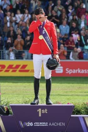 Siegerehrung, Tränen auf dem Podium, 1. Platz, Weltmeister Steve Guerdat (SUI, Schweiz) mit Pferd Dynamix de Belheme, Springen, FEI Jumping World Championship, WM, Weltmeisterschaft , FEI Jumping World Championship, Competition Individual Final, Longines-Prize, Longines-Preis, Finale Einzelwertung, Jumping , AACHEN - FEI World Championships 2026, Weltfest des Pferdesports, Reitsport Weltmeisterschaft 2026, Aachen 2026, Welcome Home 2026, Aachener Soers, 11. bis 23. August 2026, Reitsport, 23.08.2026, Aachen Aachener Soers Deutschland *** Awards Ceremony, Tears on the Podium, 1st Place, World Champion Steve Guerdat (SUI), Switzerland, riding Dynamix de Belheme, Show Jumping, FEI Jumping World Championship, FEI Jumping World Championship, Individual Final, Longines Prize, Jumping, AACHEN FEI World Championships 2026, World Festival of Equestrian Sports, 2026 World Equestrian Games, Aachen 2026, Welcome Home 2026, Aachen Soers, August 11–23, 2026, Equestrian Sports, August 23, 2026, Aachen Soers, Germany