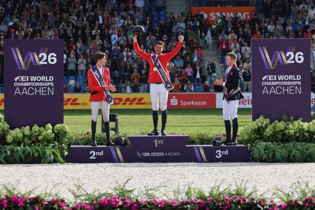 Siegerehrung, Jubel, 1. Platz, Weltmeister Steve Guerdat (SUI, Schweiz) mit Pferd Dynamix de Belheme, 2. Platz Thibeau Spits (BEL, Belgien, Belgium) mit Pferd Impress-K vaunt Kattenheye Z , Harry Charles (GBR, Vereinigtes Königsreich, Großbritannien) mit Pferd LT Holst Freda, Springen, FEI Jumping World Championship, WM, Weltmeisterschaft , FEI Jumping World Championship, Competition Individual Final, Longines-Prize, Longines-Preis, Finale Einzelwertung, Jumping , AACHEN - FEI World Championships 2026, Weltfest des Pferdesports, Reitsport Weltmeisterschaft 2026, Aachen 2026, Welcome Home 2026, Aachener Soers, 11. bis 23. August 2026, Reitsport, 23.08.2026, Aachen Aachener Soers Deutschland *** Awards Ceremony, Celebrations, 1st place: World Champion Steve Guerdat (SUI), Switzerland, riding Dynamix de Belheme; 2nd place: Thibeau Spits (BEL), Belgium, riding Impress K vaunt Kattenheye Z; Harry Charles (GBR), United Kingdom, riding LT Holst Freda; Show Jumping, FEI Jumping World Championship, FEI Jumping World Championship, Individual Final, Longines Prize, Longines Prize, Individual Final, Show Jumping, AACHEN FEI World Championships 2026, World Festival of Equestrian Sports, 2026 World Equestrian Games, Aachen 2026, Welcome Home 2026, Aachener Soers, August 11–23, 2026, Equestrian Sports, August 23, 2026, Aachen Aachener Soers Germany