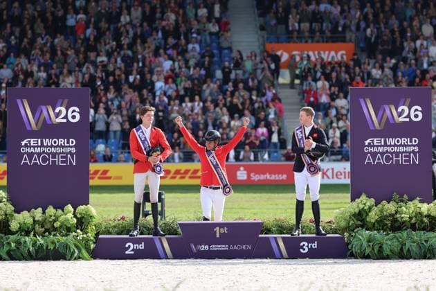 Siegerehrung, Jubel, 1. Platz, Weltmeister Steve Guerdat (SUI, Schweiz) mit Pferd Dynamix de Belheme, 2. Platz Thibeau Spits (BEL, Belgien, Belgium) mit Pferd Impress-K vaunt Kattenheye Z , Harry Charles (GBR, Vereinigtes Königsreich, Großbritannien) mit Pferd LT Holst Freda, Springen, FEI Jumping World Championship, WM, Weltmeisterschaft , FEI Jumping World Championship, Competition Individual Final, Longines-Prize, Longines-Preis, Finale Einzelwertung, Jumping , AACHEN - FEI World Championships 2026, Weltfest des Pferdesports, Reitsport Weltmeisterschaft 2026, Aachen 2026, Welcome Home 2026, Aachener Soers, 11. bis 23. August 2026, Reitsport, 23.08.2026, Aachen Aachener Soers Deutschland *** Awards Ceremony, Cheering, 1st place: World Champion Steve Guerdat (SUI), Switzerland, riding Dynamix de Belheme; 2nd place: Thibeau Spits (BEL), Belgium, riding Impress K vaunt Kattenheye Z; Harry Charles (GBR), United Kingdom, riding LT Holst Freda; Show Jumping, FEI Jumping World Championship, FEI Jumping World Championship, Individual Final, Longines Prize, Longines Prize, Individual Final, Show Jumping, AACHEN FEI World Championships 2026, World Festival of Equestrian Sports, 2026 Equestrian World Championships, Aachen 2026, Welcome Home 2026, Aachen Soers, August 11–23, 2026, Equestrian Sports, August 23, 2026, Aachen Soers, Germany