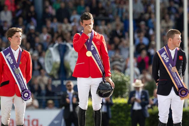 Steve GUERDAT (SUI) (mi.) auf Dynamix de Belheme gewinnt die Gold Medaille und vergisst Freudentraenen, Thibeau SPITS (BEL) (li.) auf Impress-K van t Kattenheye Z gewinnt Silber, Harry CHARLES (GBR) (re.) auf LT Holst Fredaauf gewinnt Bronze, Jubel, Freude, Lachen, Siegerehrung, Springen S3, Umlauf A, FEI Jumping World Championship, WM, Weltmeisterschaft - Individual Final - LONGINES-Preis, am 23.08.2026, FEI Reit Weltmeisterschaft Aachen 2026 vom 11. - 23.08.2026 in Aachen Deutschland; Â *** Steve GUERDAT (SUI), riding Dynamix de Belheme, wins the gold medal and sheds tears of joy; Thibeau SPITS (BEL), riding Impress K van t Kattenheye Z, wins silver; Harry CHARLES (GBR), riding LT Holst Fredaauf, wins bronze; Cheers, joy, laughter, award ceremony, Jumping S3, Round A, FEI Jumping World Championship Individual Final LONGINES Prize, on August 23, 2026, FEI World Equestrian Games Aachen 2026, August 11–23, 2026, in Aachen, Germany Â