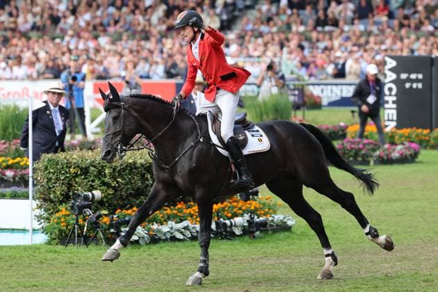Jubel zum 2. Platz, Thibeau Spits (BEL, Belgien, Belgium) mit Pferd Impress-K vaunt Kattenheye Z, Springen, FEI Jumping World Championship, WM, Weltmeisterschaft , FEI Jumping World Championship, Competition Individual Final, Longines-Prize, Longines-Preis, Finale Einzelwertung, Jumping , AACHEN - FEI World Championships 2026, Weltfest des Pferdesports, Reitsport Weltmeisterschaft 2026, Aachen 2026, Welcome Home 2026, Aachener Soers, 11. bis 23. August 2026, Reitsport, 23.08.2026, Aachen Aachener Soers Deutschland *** Celebrations for 2nd place: Thibeau Spits (BEL, Belgium) with his horse Impress K vaunt Kattenheye Z, Show Jumping, FEI Jumping World Championship, FEI Jumping World Championship, Individual Final, Longines Prize, Jumping, AACHEN FEI World Championships 2026, World Festival of Equestrian Sports, 2026 Equestrian World Championships, Aachen 2026, Welcome Home 2026, Aachen Soers, August 11–23, 2026, Equestrian Sports, August 23, 2026, Aachen Soers, Germany