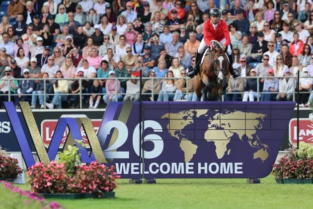 Weltmeister Steve Guerdat (SUI, Schweiz) mit Pferd Dynamix de Belheme am WM-Sprung , Springen, FEI Jumping World Championship, WM, Weltmeisterschaft , FEI Jumping World Championship, Competition Individual Final, Longines-Prize, Longines-Preis, Finale Einzelwertung, Jumping , AACHEN - FEI World Championships 2026, Weltfest des Pferdesports, Reitsport Weltmeisterschaft 2026, Aachen 2026, Welcome Home 2026, Aachener Soers, 11. bis 23. August 2026, Reitsport, 23.08.2026, Aachen Aachener Soers Deutschland *** World Champion Steve Guerdat (SUI, Switzerland) with his horse Dynamix de Belheme at the World Championships in Jumping, FEI Jumping World Championship, FEI Jumping World Championship, Individual Final, Longines Prize, Jumping, AACHEN FEI World Championships 2026, World Festival of Equestrian Sports, 2026 Equestrian World Championships, Aachen 2026, Welcome Home 2026, Aachen Soers, August 11–23, 2026, Equestrian Sports, August 23, 2026, Aachen Soers, Germany