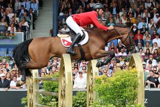 Weltmeister Steve Guerdat (SUI, Schweiz) mit Pferd Dynamix de Belheme am WM-Sprung , Springen, FEI Jumping World Championship, WM, Weltmeisterschaft , FEI Jumping World Championship, Competition Individual Final, Longines-Prize, Longines-Preis, Finale Einzelwertung, Jumping , AACHEN - FEI World Championships 2026, Weltfest des Pferdesports, Reitsport Weltmeisterschaft 2026, Aachen 2026, Welcome Home 2026, Aachener Soers, 11. bis 23. August 2026, Reitsport, 23.08.2026, Aachen Aachener Soers Deutschland *** World Champion Steve Guerdat (SUI, Switzerland) with his horse Dynamix de Belheme at the World Championships in Jumping, FEI Jumping World Championship, FEI Jumping World Championship, Individual Final, Longines Prize, Jumping, AACHEN FEI World Championships 2026, World Festival of Equestrian Sports, 2026 Equestrian World Championships, Aachen 2026, Welcome Home 2026, Aachen Soers, August 11–23, 2026, Equestrian Sports, August 23, 2026, Aachen Soers, Germany