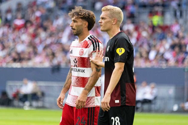 Düsseldorf, Deutschland 23. August 2026: DFB-Pokal - 2026 2027 - 1. Runde - Fortuna Düsseldorf gegen SC Freiburg Im Bild: v.li. Fabian Schleusener (F95) und Matthias Ginter (SCF) DFL DFB regulations prohibit any use of photographs as image sequences and or quasi-video. Merkur Spiel Arena Nordrhein Westfalen *** Düsseldorf, Germany August 23, 2026 DFB Cup 2026–2027 First Round: Fortuna Düsseldorf vs. SC Freiburg Pictured, from left: Fabian Schleusener (F95) and Matthias Ginter (SCF). DFL and DFB regulations prohibit any use of photographs as image sequences and or quasi-video. Merkur Spiel Arena, North Rhine-Westphalia Copyright: xFotostandx xGörtzx