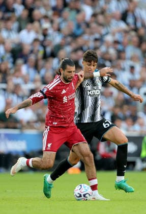 Newcastle United v Liverpool - Premier League 2026 27 Dominik Szoboszlai of Liverpool and Lewis Miley of Newcastle United challenge during the Premier League 2026 27 match between Newcastle United and Liverpool FC at St James Park on August 23, 2026 in Newcastle upon Tyne, England. WARNING! This Photograph May Only Be Used For Newspaper And Or Magazine Editorial Purposes. May Not Be Used For Publications Involving 1 player, 1 Club Or 1 Competition Without Written Authorisation From Football DataCo Ltd. For Any Queries, Please Contact Football DataCo Ltd on +44 (0) 207 864 9121 Newcastle upon Tyne St. James Park England United Kingdom Copyright: xAllstarxPicturexLibraryxLtdx