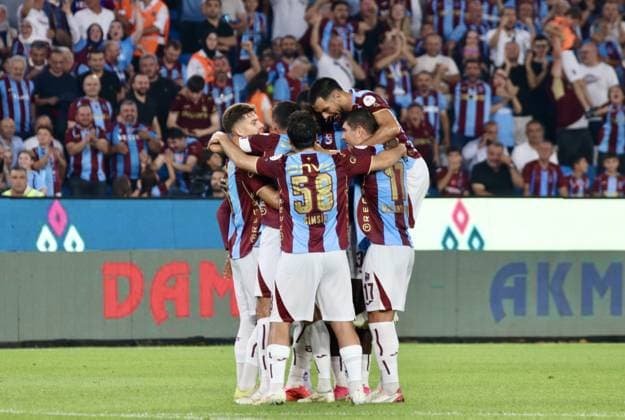 Trabzonspor v Basaksehir - Turkish Super Lig TRABZON, TURKIYE - AUGUST 23: Trabzonspor players celebrate after scoring a goal during the Turkish Super Lig week 2 match between Trabzonspor and Istanbul Basaksehir at Papara Park in Trabzon, Turkiye, on August 23, 2026. Enes Sansar Anadolu Trabzon Turkey. Editorial use only. Please get in touch for any other usage.  Copyright: x2026xAnadoluxEnesxSansarx