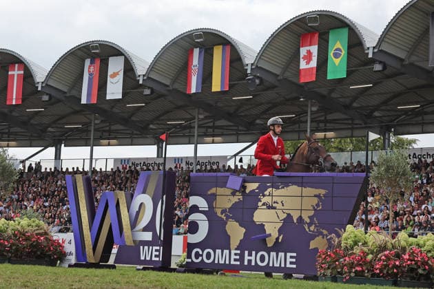 Richard Vogel (GER, Deutschland) mit Pferd Unites Touch S, aktueller Europameister und Sieger des Rolex Grand Prix von Aachen 2026 (CHIO Aachen) scheitert an der WM-Mauer, Springfehler , Springen, FEI Jumping World Championship, WM, Weltmeisterschaft , FEI Jumping World Championship, Competition Individual Final, Longines-Prize, Longines-Preis, Finale Einzelwertung, Jumping , AACHEN - FEI World Championships 2026, Weltfest des Pferdesports, Reitsport Weltmeisterschaft 2026, Aachen 2026, Welcome Home 2026, Aachener Soers, 11. bis 23. August 2026, Reitsport, 23.08.2026, Aachen Aachener Soers Deutschland *** Richard Vogel (GER, Germany), riding Unites Touch S, the reigning European champion and winner of the 2026 Rolex Grand Prix at CHIO Aachen, fails to clear the World Championship wall; jumping fault; show jumping; FEI Jumping World Championship; FEI Jumping World Championship, Individual Final, Longines Prize, Jumping, AACHEN FEI World Championships 2026, World Equestrian Festival, 2026 World Equestrian Games, Aachen 2026, Welcome Home 2026, Aachen Soers, August 11–23, 2026, Equestrian Sports, August 23, 2026, Aachen Soers, Germany