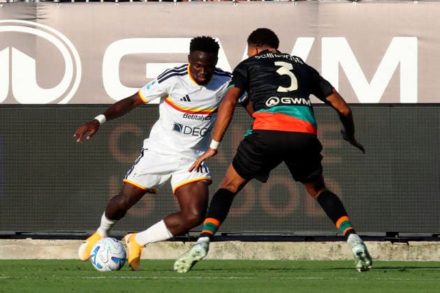 Lecce™s Konan N Dri 11 Venezia s Joel Schingtienne (3 Venezia FC) during the Serie A soccer match between Venezia FC and US Lecce in the Pier Luigi Penzo Stadium di Venice,north east Italy - August 23, 2026. - Soccer  Copyright: xPaolaxGarbuio LaPressex
