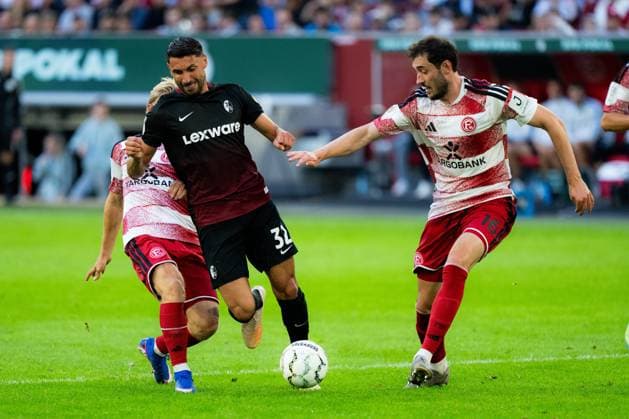 Fortuna Düsseldorf v SC Freiburg - DFB-Pokal First Round Yuito Suzuki of SC Freiburg in action during the DFB-Pokal First Round match between Fortuna Düsseldorf and SC Freiburg at Merkur Spiel-Arena in Düsseldorf, Germany, August 23, 2026. Dusseldorf Merkur Spiel-Arena North Rhine-Westphalia Germany Copyright: xTaiseixIwamotox