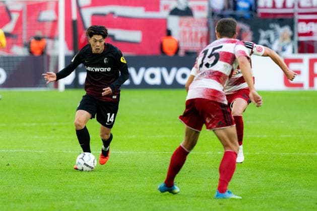 Fortuna Düsseldorf v SC Freiburg - DFB-Pokal First Round Yuito Suzuki of SC Freiburg in action during the DFB-Pokal First Round match between Fortuna Düsseldorf and SC Freiburg at Merkur Spiel-Arena in Düsseldorf, Germany, August 23, 2026. Dusseldorf Merkur Spiel-Arena North Rhine-Westphalia Germany Copyright: xTaiseixIwamotox