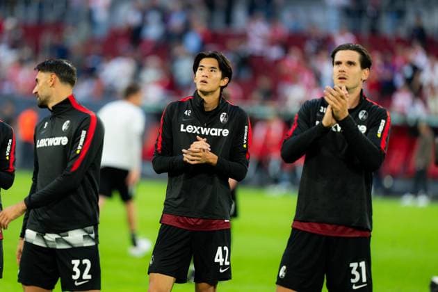 Fortuna Düsseldorf v SC Freiburg - DFB-Pokal First Round Keisuke Goto celebrate together after the final whistle following their victory over Fortuna Dusseldorf in the DFB-Pokal first round at Merkur Spiel-Arena in Dusseldorf, Germany, August 23, 2026. Dusseldorf Merkur Spiel-Arena North Rhine-Westphalia Germany Copyright: xTaiseixIwamotox