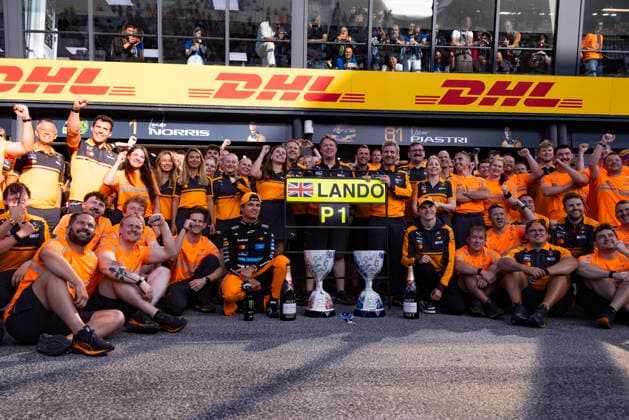 Formula 1 Heineken Dutch Grand Prix 2026 Grégoire PLACCA OVERTAKE MAXPPP - Zandvoort 23 08 2026 01 NORRIS Lando (gbr), McLaren Mastercard F1 Team, P1 team and mechanics with trophy for celebration post-race with 81 PIASTRI Oscar (aus) at the Formula 1 Heineken Dutch Grand Prix 2026, the 12th round of the 2026 FIA Formula 1 World Championship, WM, Weltmeisterschaft at Circuit Zandvoort in Zandvoort, Netherlands, from 20 to 23 August 2026 Zandvoort Circuit Zandvoort Netherlands  Copyright: xOVERTAKE MAXPPPxGrégoirexPLACCAx OVT202608236793 OVT202608236793