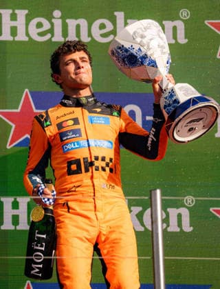 F1 Dutch Grand Prix - Lando Norris Celebrates Victory Lando Norris of McLaren Mastercard Formula 1 Team holds his trophy on the podium during the 2026 Formula 1 Heineken Dutch Grand Prix at the Zandvoort Circuit in Zandvoort, Netherlands on August 23, 2026. Photo by Antoine Lapeyre Reveries Agency ABACAPRESS.COM Zandvoort Netherlands  Copyright: xAntoinexLapeyre ReveriesxAgency ABACAx