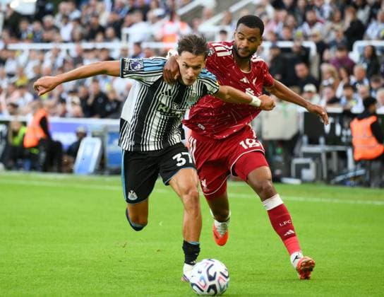 Amar Dedic of Newcastle United fends off Cody Gakpo of Liverpool Newcastle United v Liverpool, Premier League Football, Football, St James Park, Newcastle, UK - 23 Aug 2026Newcastle St James Park United Kingdom EDITORIAL USE ONLY No use with unauthorised audio, video, data, fixture lists, club league logos or live services. Online in-match use limited to 120 images, no video emulation. No use in betting, games or single club league player publications.  Copyright: xRichardxLee Shutterstockx 17112314cn