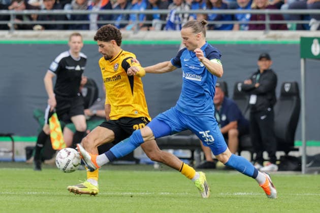 23.08.2026, xgrfx, Fussball DFB Pokal 1.Runde, SV Westfalia Rhynern - Dynamo Dresden v.l. Ben Bobzien (Dynamo Dresden), Michael Wiese (SV Westfalia Rhynern) (DFL DFB REGULATIONS PROHIBIT ANY USE OF PHOTOGRAPHS as IMAGE SEQUENCES and or QUASI-VIDEO) Münster *** August 23, 2026, xgrfx, Soccer DFB Cup 1st Round, SV Westfalia Rhynern vs. Dynamo Dresden, Ben Bobzien (Dynamo Dresden), Michael Wiese (SV Westfalia Rhynern). DFL and DFB regulations prohibit any use of photographs as image sequences and or quasi-video. Münster