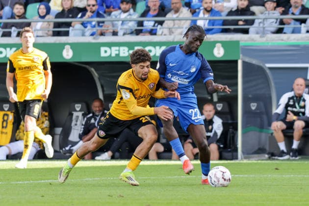 23.08.2026, xgrfx, Fussball DFB Pokal 1.Runde, SV Westfalia Rhynern - Dynamo Dresden v.l. Ben Bobzien (Dynamo Dresden), Elias Opoku (SV Westfalia Rhynern) (DFL DFB REGULATIONS PROHIBIT ANY USE OF PHOTOGRAPHS as IMAGE SEQUENCES and or QUASI-VIDEO) Münster *** August 23, 2026, xgrfx, Soccer DFB Cup First Round, SV Westfalia Rhynern vs. Dynamo Dresden – Ben Bobzien (Dynamo Dresden), Elias Opoku (SV Westfalia Rhynern). DFL and DFB regulations prohibit any use of photographs as image sequences and or quasi-video. Münster